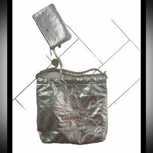 Silver bag with logo Chanel .